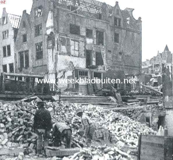 Aen d'Amstel en aen 't Y, daer doet sich heerlijck ope .! Afbraak der huizen aan de achterzijde uitkomende op het Beurspleintje