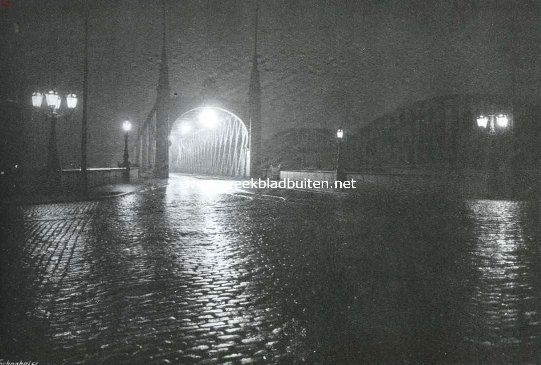 Over regen. Bij de Maasbrug te Rotterdam in den regenavond