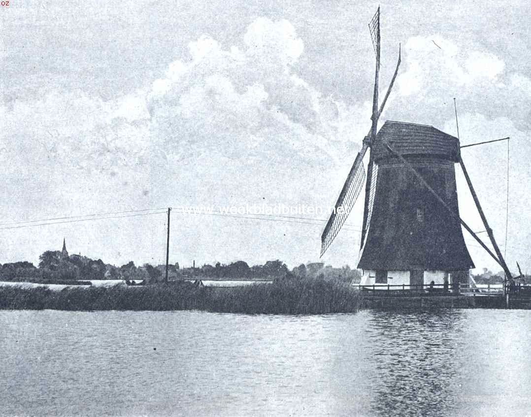 De Rotte en haar omgeving. Langs de Rotte. Een der mooie watermolens aan de Rotte. Op den achtergrond het dorp Hillegersberg