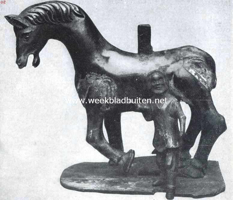 De te Halsteren gevonden doopvont. Het kroonstuk der vont te Halsteren. Het paard van St. Maarten met bedelaar