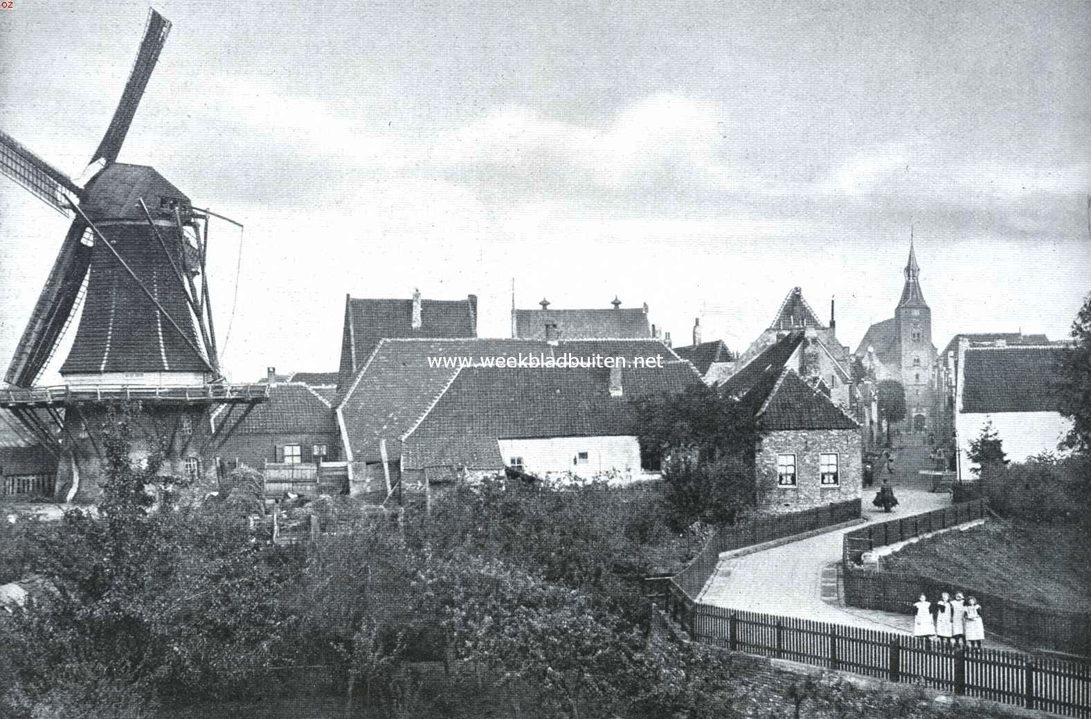 Gezicht op den ouden molen en de kerk te Hattem