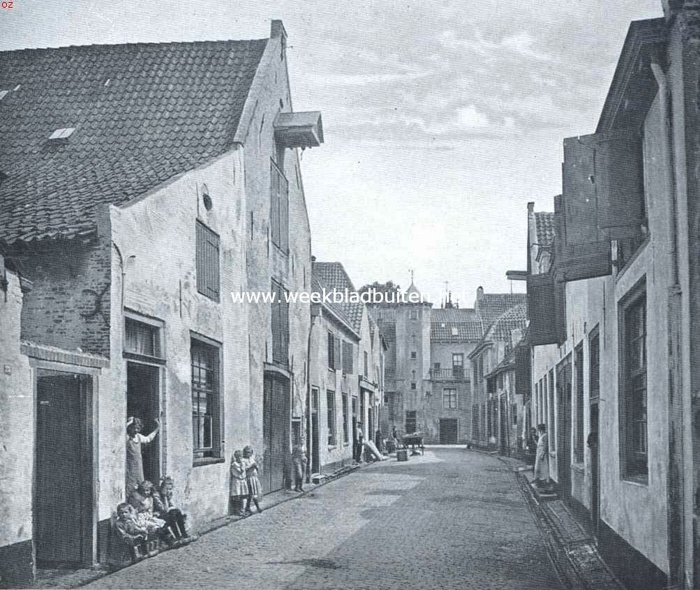 Gezicht uit de Valkestraat op de Muurhuizen