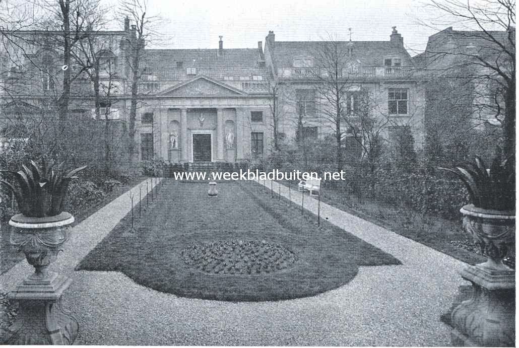 Het huis van de familie Van Loon. Tuin en tuinhuis achter het huis van de familie Van Loon