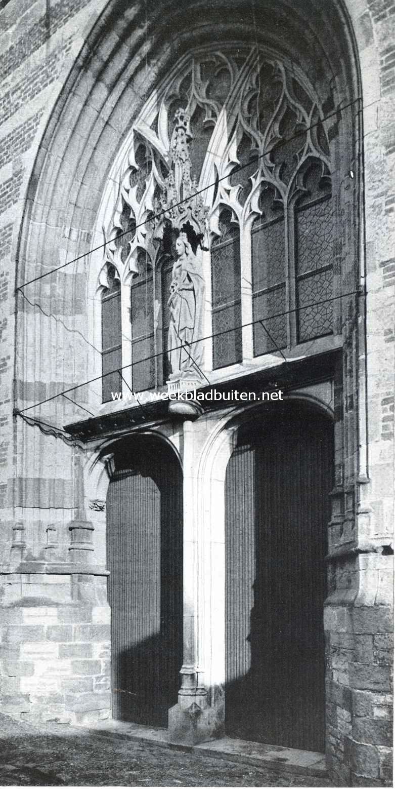 De St. Cunera-kerk te Rhenen. Poort, bedoeld als hoofdingang, met beeld van de Heilige Cunera