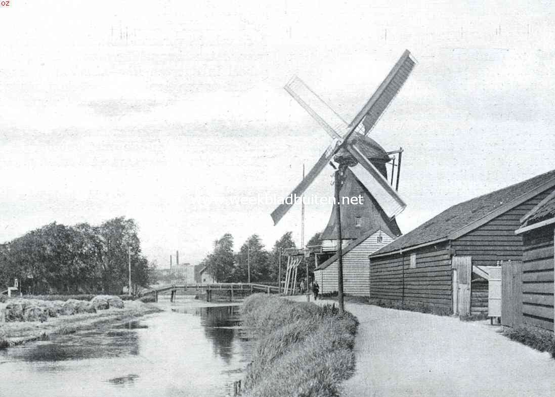 De groote Moloch. Het smalle dijkje tusschen Zaandijk en Wormerveer, waarover de stelling van den molen 