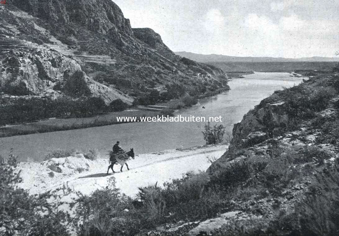 Spaansch landschap met water. De Ebro bij Tortosa