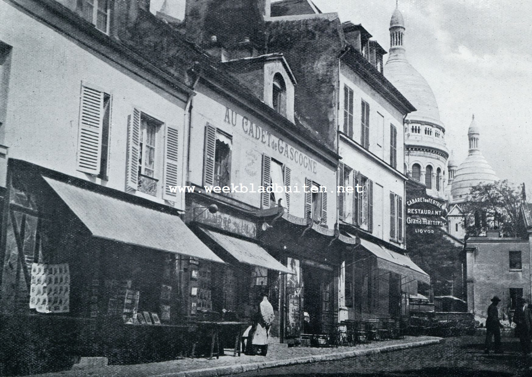 DE PLACE DU TERTRE OP MONTMARTRE MET OVERAL MUZIEK, ZANG EN DANS