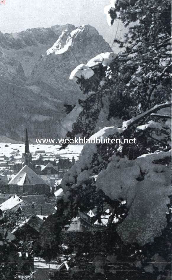 Garmisch-Partenkirchen in den winter. Partenkirchen in den winter met links de Zugspitze